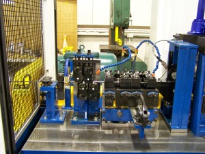 Multi-roll straightener or stressing unit (post wire forming)
