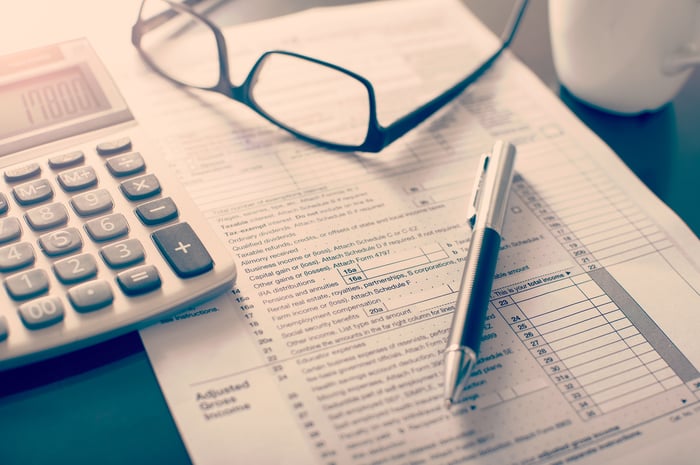 desk financial tax documents calculator 1